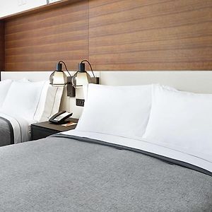 Queen Room Two Queen Beds Mobility or Hearing Accessible Roll Shower